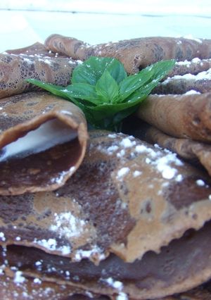 Una foto de Crepês de chocolate y café