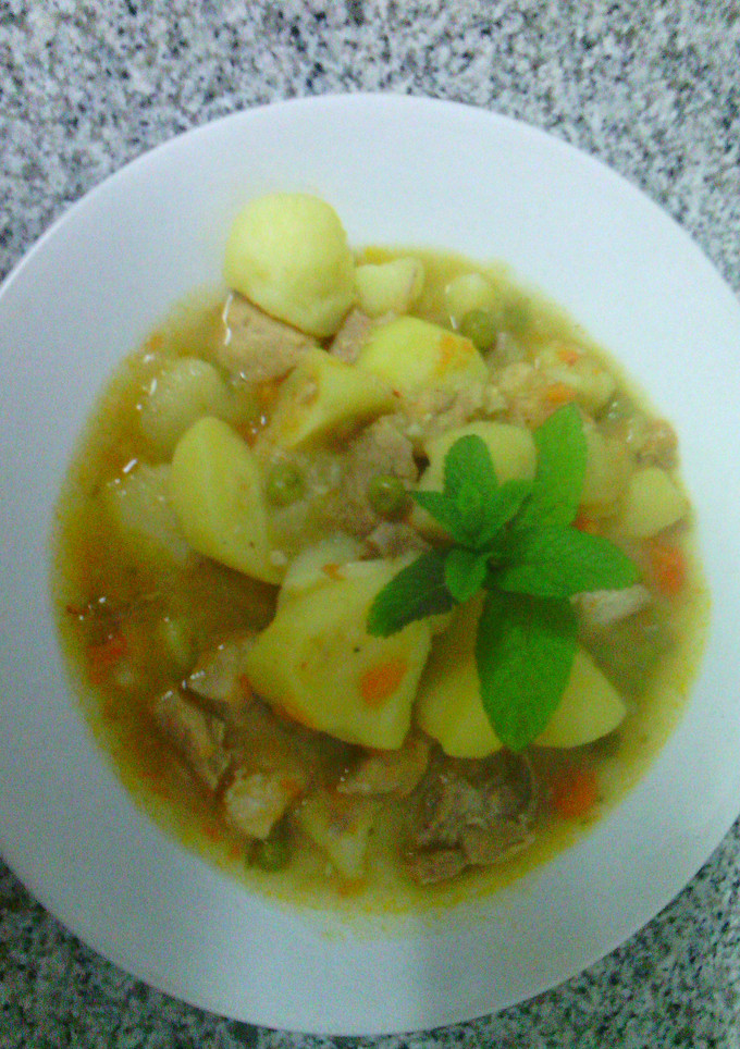 Una foto de patatas con carne