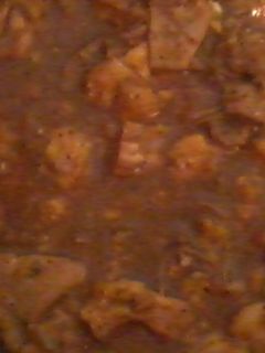 Una foto de Chicharrones en su jugo con chipotle