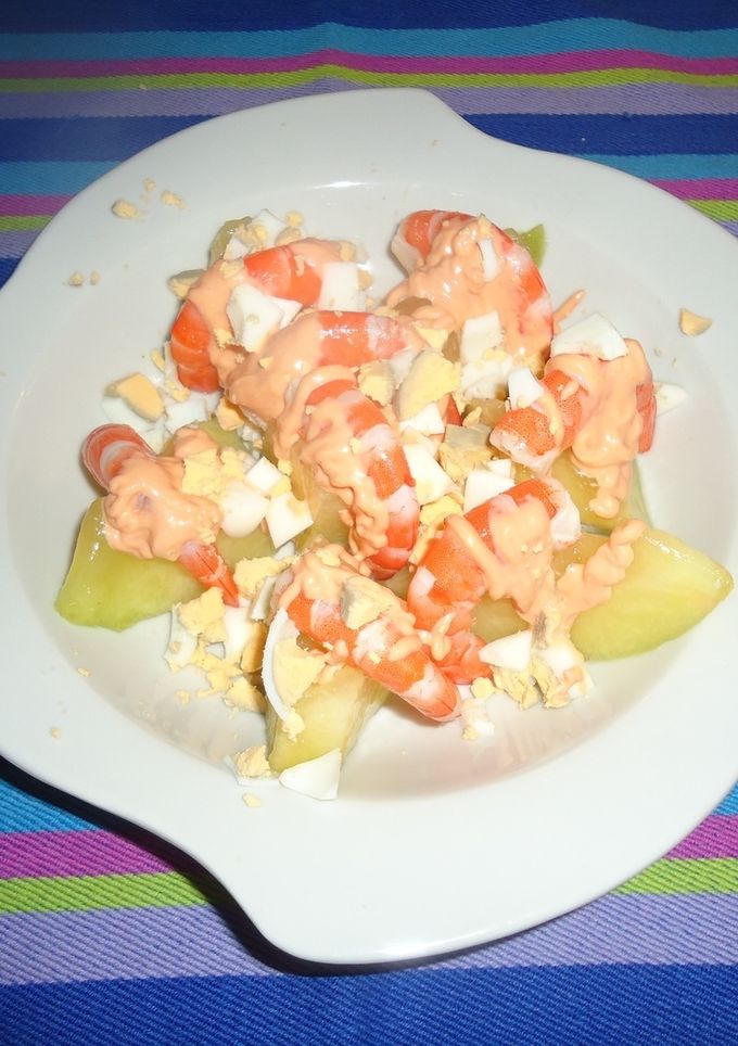 Una foto de Melón con langostinos