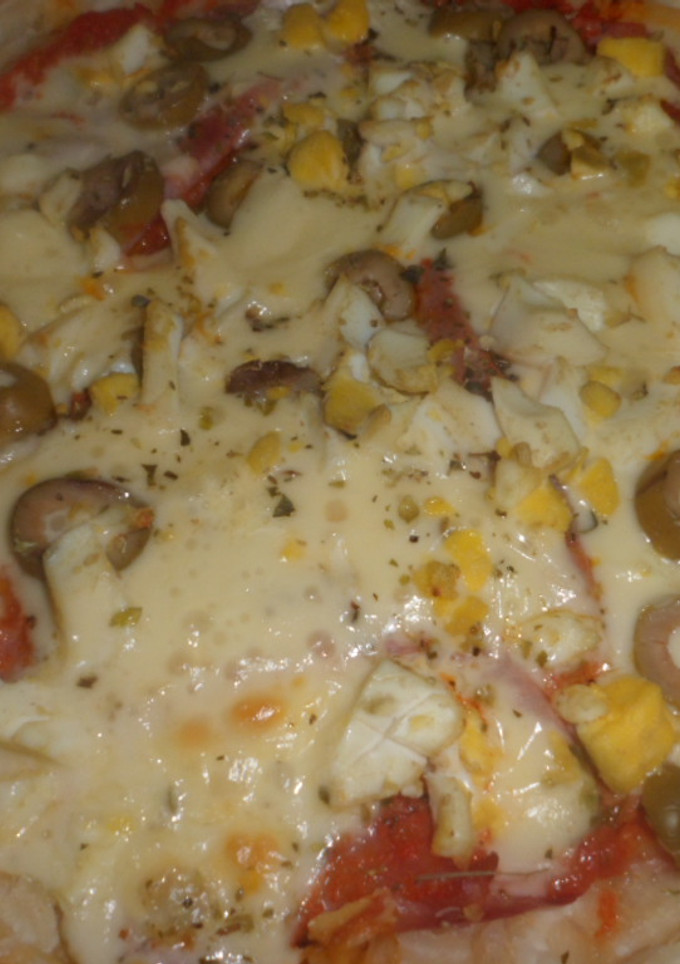 Una foto de Pizza a la napolitana con masa de tarta