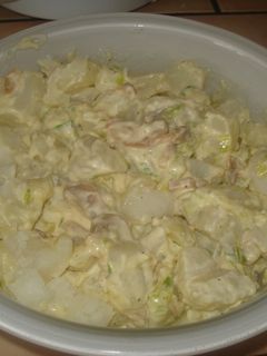 Una foto de Papas en salsa de queso crema