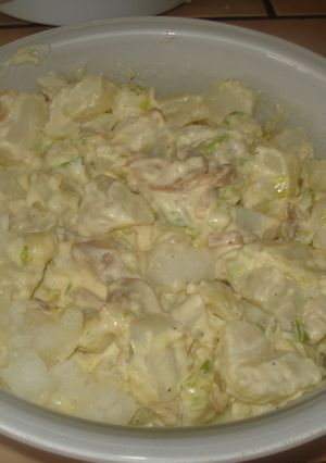 Una foto de Papas en salsa de queso crema