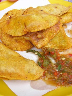 Una foto de Tacos al vapor de chicharrón guisado