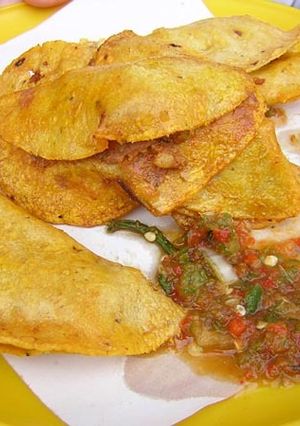 Una foto de Tacos al vapor de chicharrón guisado