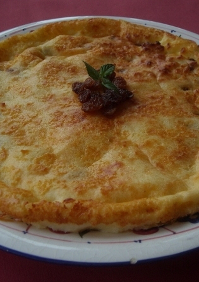 Una foto de Tarta de queso de Burgos, pasas y ron