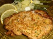 Una foto de milanesa de nalga o cuadrada