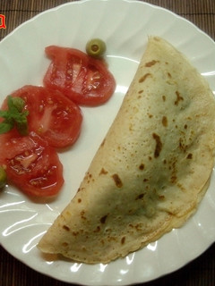 Una foto de Crepes rellenas de espinacas y queso