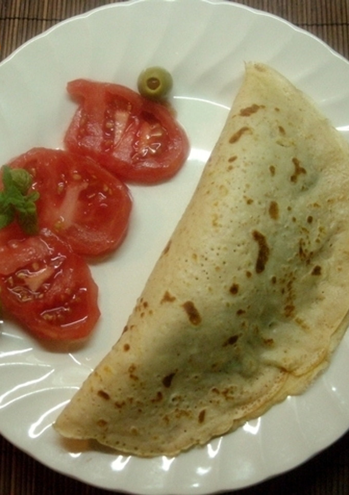 Una foto de Crepes rellenas de espinacas y queso