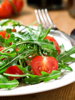 Una foto de Ensalada de rúcula con aliño de mostaza y miel