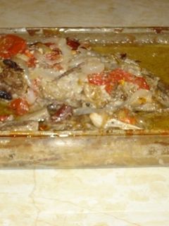 Una foto de Khorma de cordero con tomate