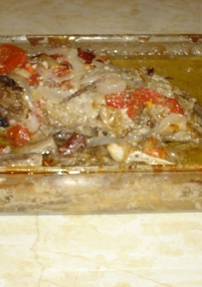 Una foto de Khorma de cordero con tomate