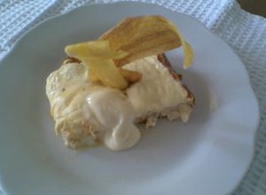 Una foto de Molde de pollo con salsa de queso