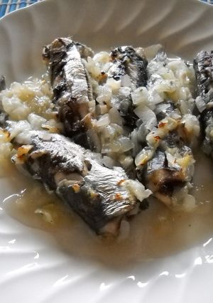 Una foto de Sardinas encebolladas al horno