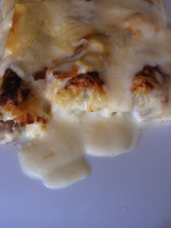 Una foto de Canelones con bechamel