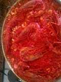 Arroz rojo con carabineros