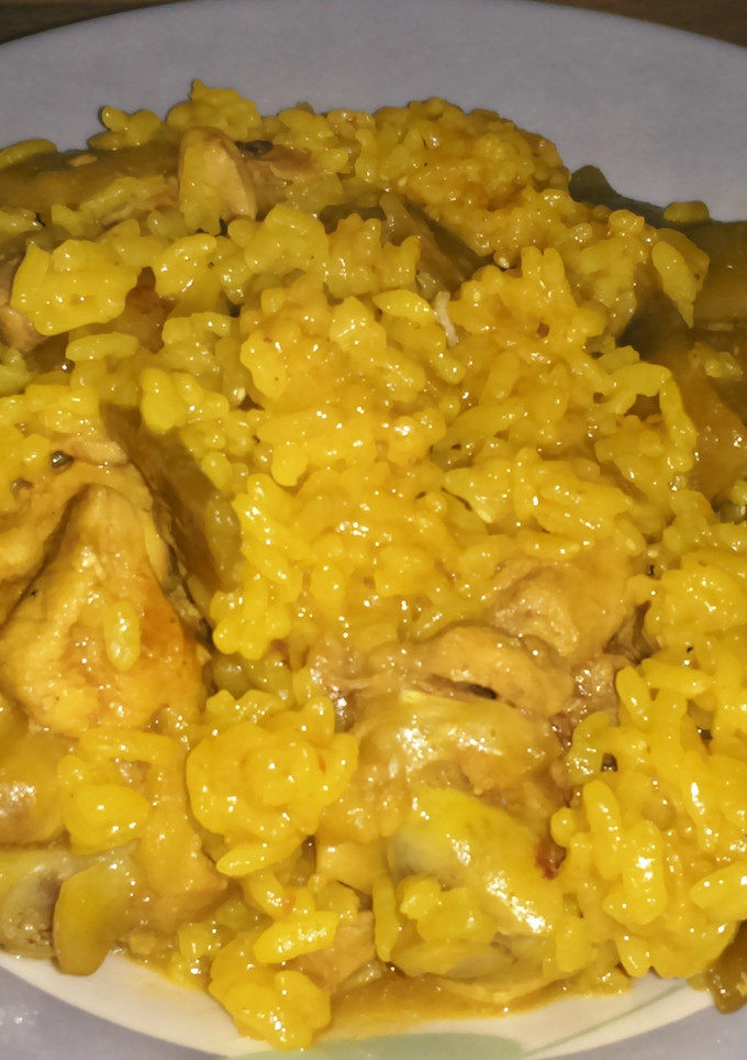 Una foto de Arroz meloso con pollo