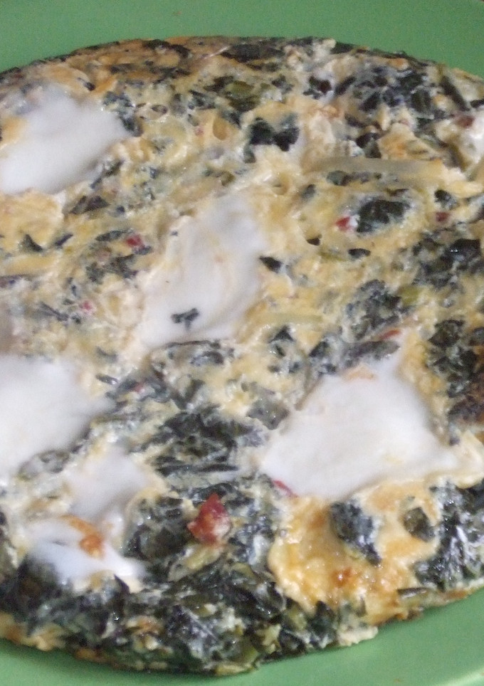 Una foto de Tortilla de verdura con jamón y mozzarella de búfala