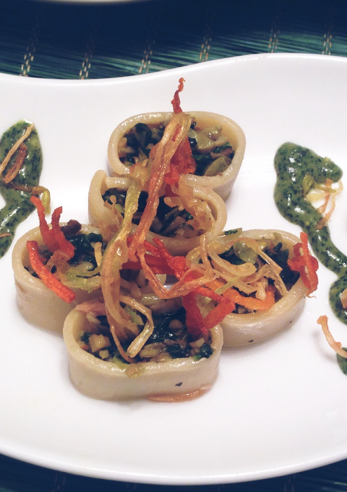 Una foto de Pasta calamari