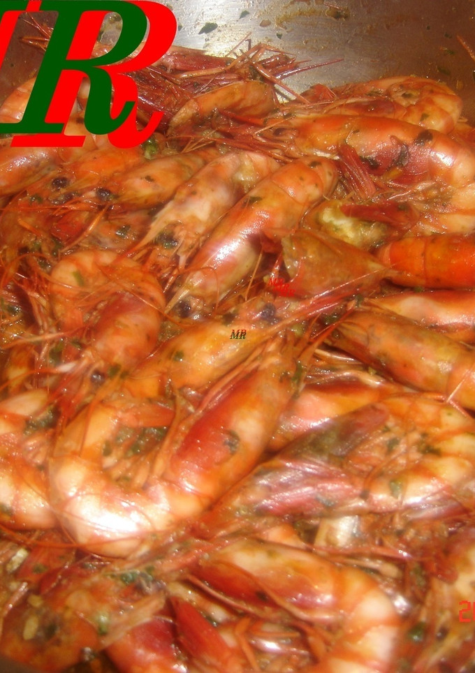 Una foto de Gambas o langostinos al coñac