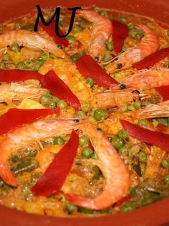Una foto de Paella de mariscos en olla de barro