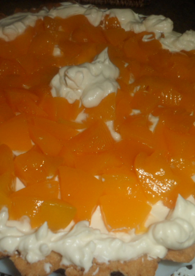 Una foto de Tarta de duraznos con crema
