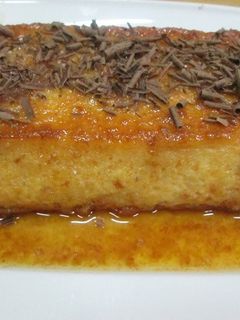 Una foto de Budín de pan y yemas avainillado