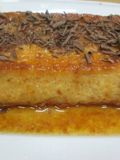 Una foto de Budín de pan y yemas avainillado