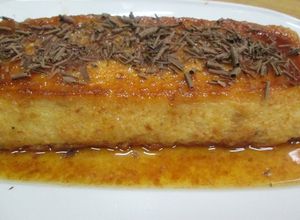 Una foto de Budín de pan y yemas avainillado