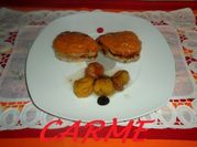 Una foto de filetes de cerdo a la pimienta