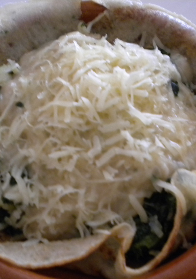 Una foto de Crepes gratinados de pescado