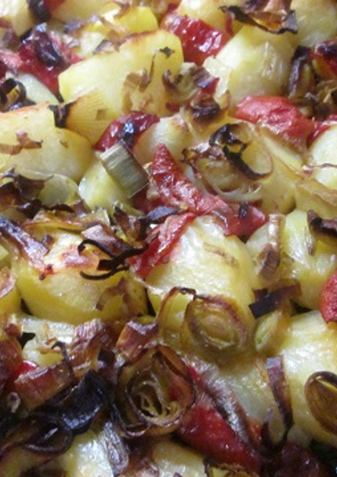 Una foto de Patatas con cebolleta al horno