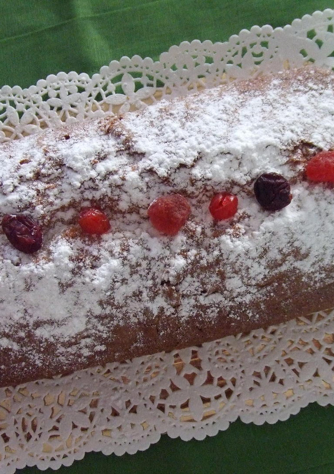 Una foto de Cake de frutos rojos y nueces de macadamia