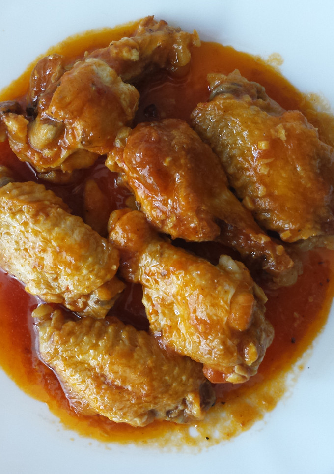 Una foto de 🇪🇸 Alitas de pollo al azafrán 🇪🇸