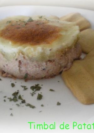 Una foto de Timbal de patata rellena