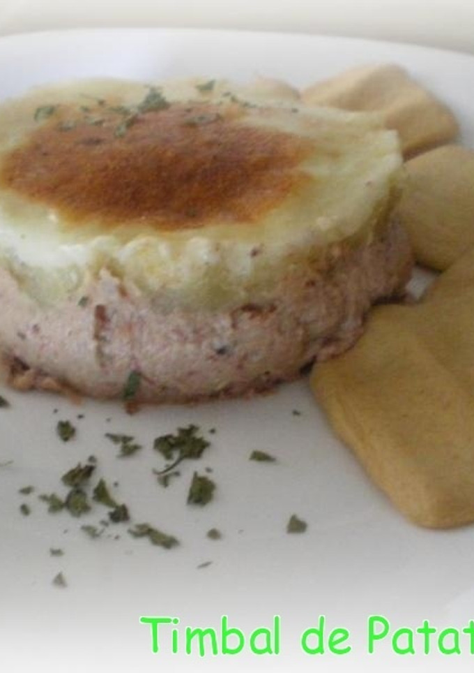 Una foto de Timbal de patata rellena