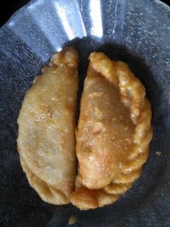 Una foto de Empanadas regional Santiagueñas de piernas abiertas