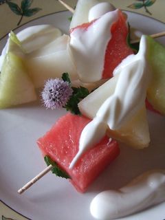 Una foto de Brochetas de melones al oporto