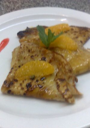 Una foto de Crêpes Suzzettes con sabor cítrico