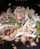 Bisteck con morrón y cebolla
