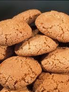 Una foto de Tarta de queso y bizcochos amaretti