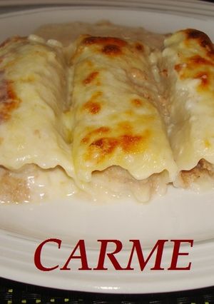 Una foto de Canelones trufados