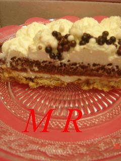 Una foto de Tarta cuatro capas y mouse de chocolate