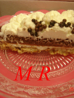 Una foto de Tarta cuatro capas y mouse de chocolate