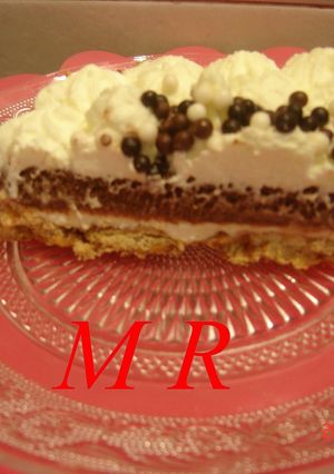 Una foto de Tarta cuatro capas y mouse de chocolate