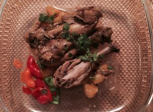 Una foto de Pollo con champagne y naranjas