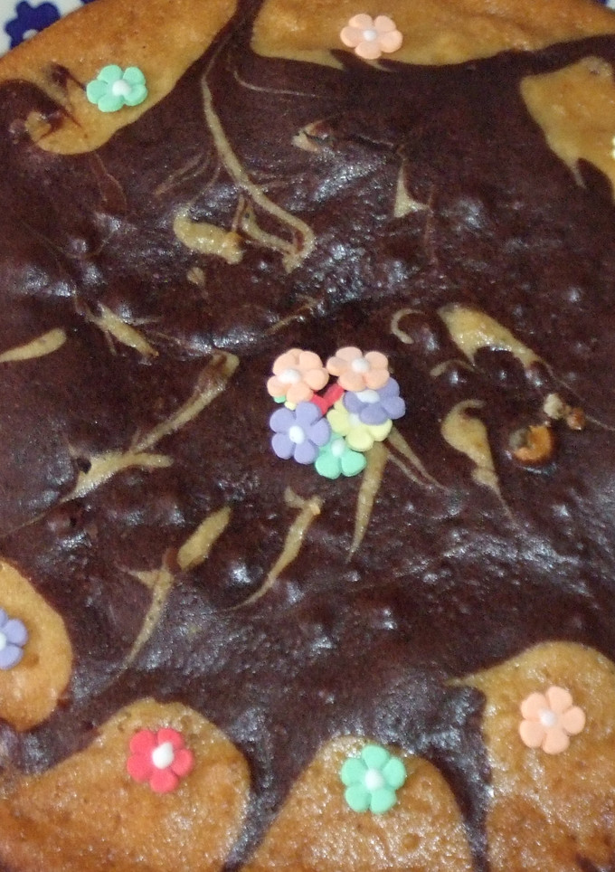 Una foto de Pastel de naranja y cacao 