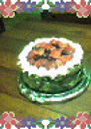 Una foto de Devils'food cake con relleno de frutillas y crema