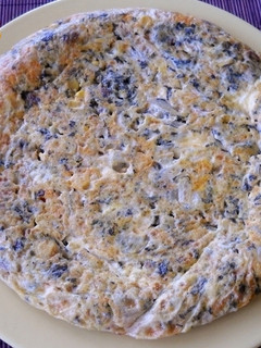Una foto de Tortilla de verduras con maíz y pasas