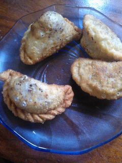 Una foto de Empanada tucumana de pollo tipo Famillá